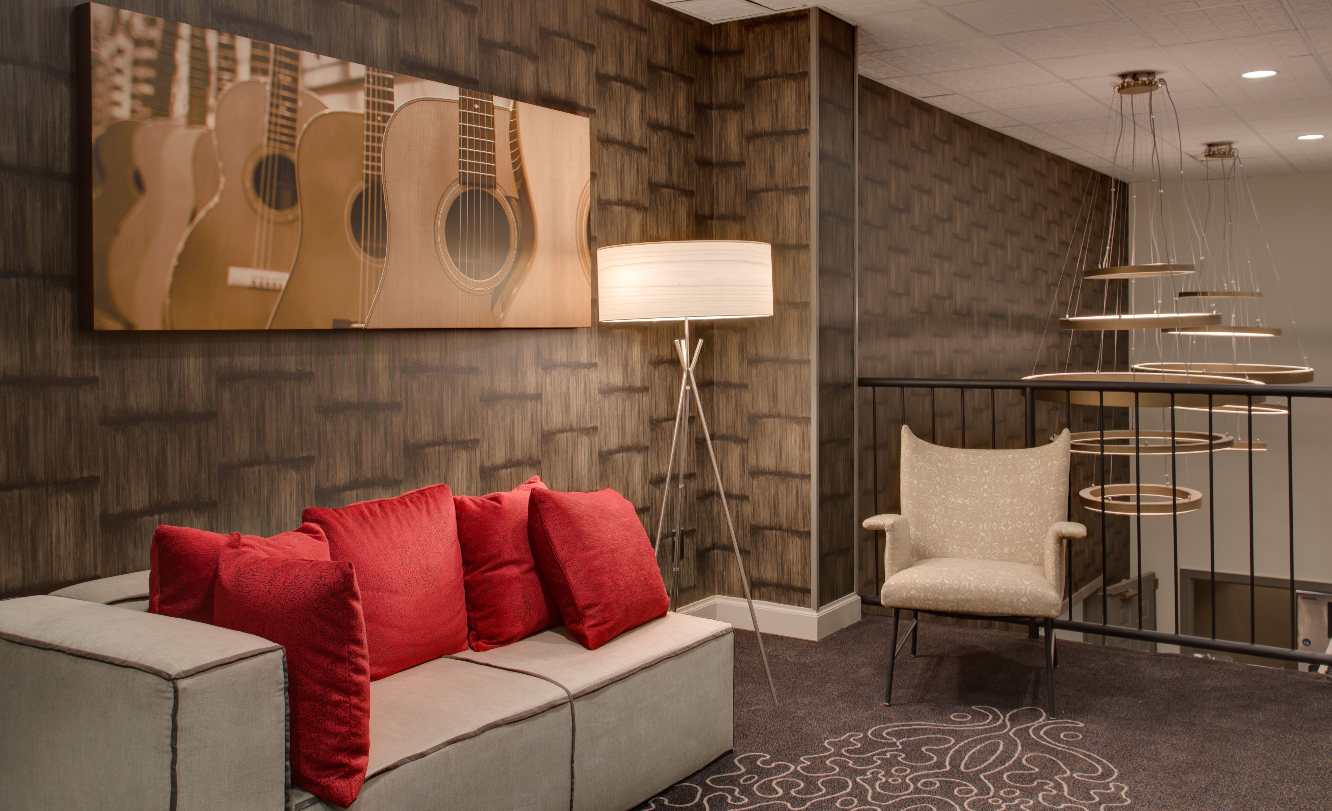 Image of a piece of guitar-themed art in one of the seating areas at The Union Station Nashville Yards, a member of Historic Hotels of America since 2015, located in Nashville, Tennessee